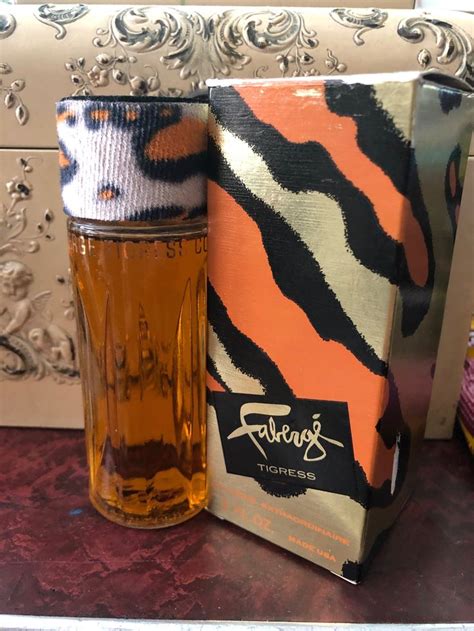 cologne with tiger on bottle.